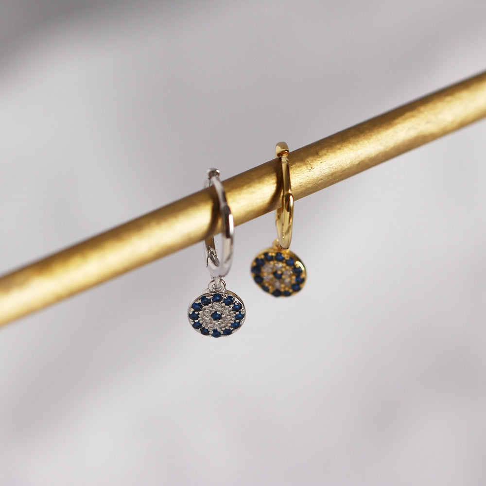 ROUND EVIL EYE HUGGIE HOOP EARRINGS