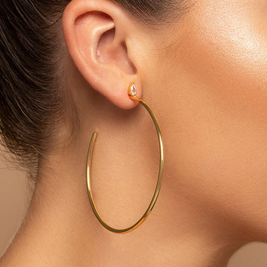 ROUND AND ROUND WE GO HOOP EARRINGS